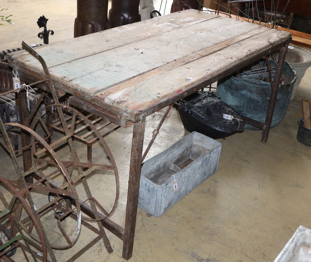 An Indian teak and metal folding table, W.154cm, D.76cm, H.78cm